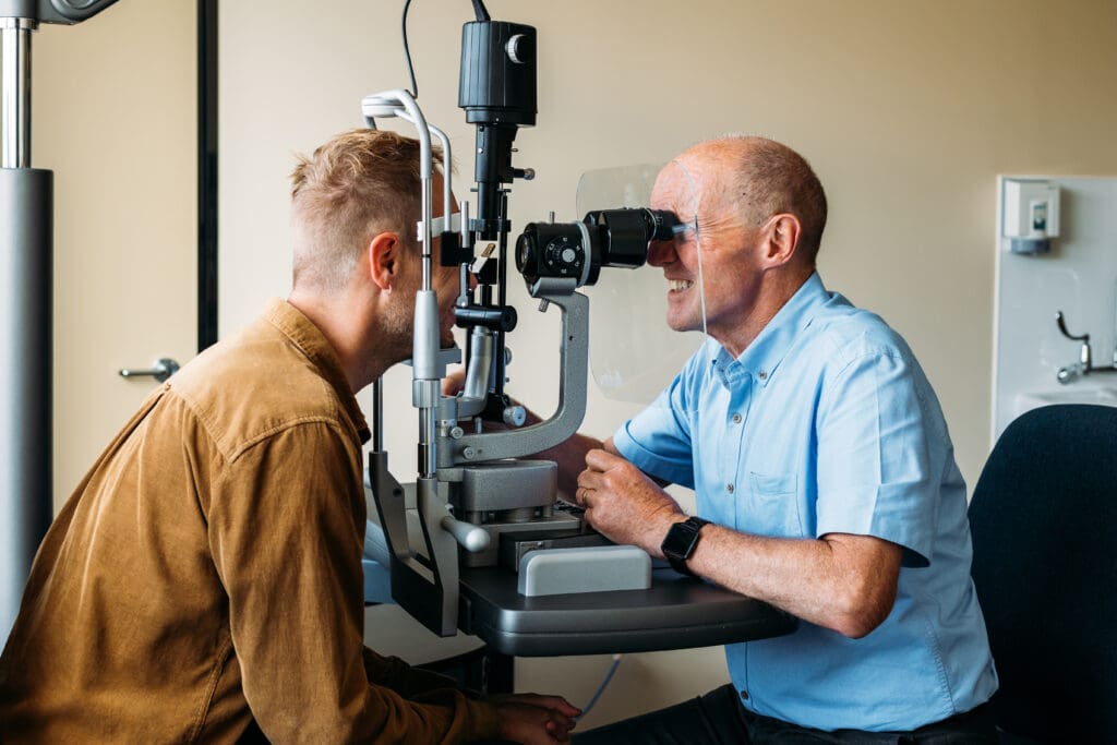 Dr Logan performing Slit Lamp Examination